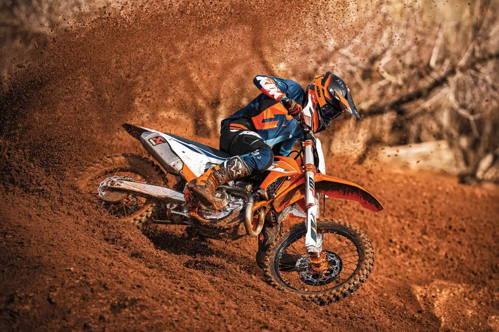 KTM dirt bike rider drifting on desert track – Dubai motocross adventure